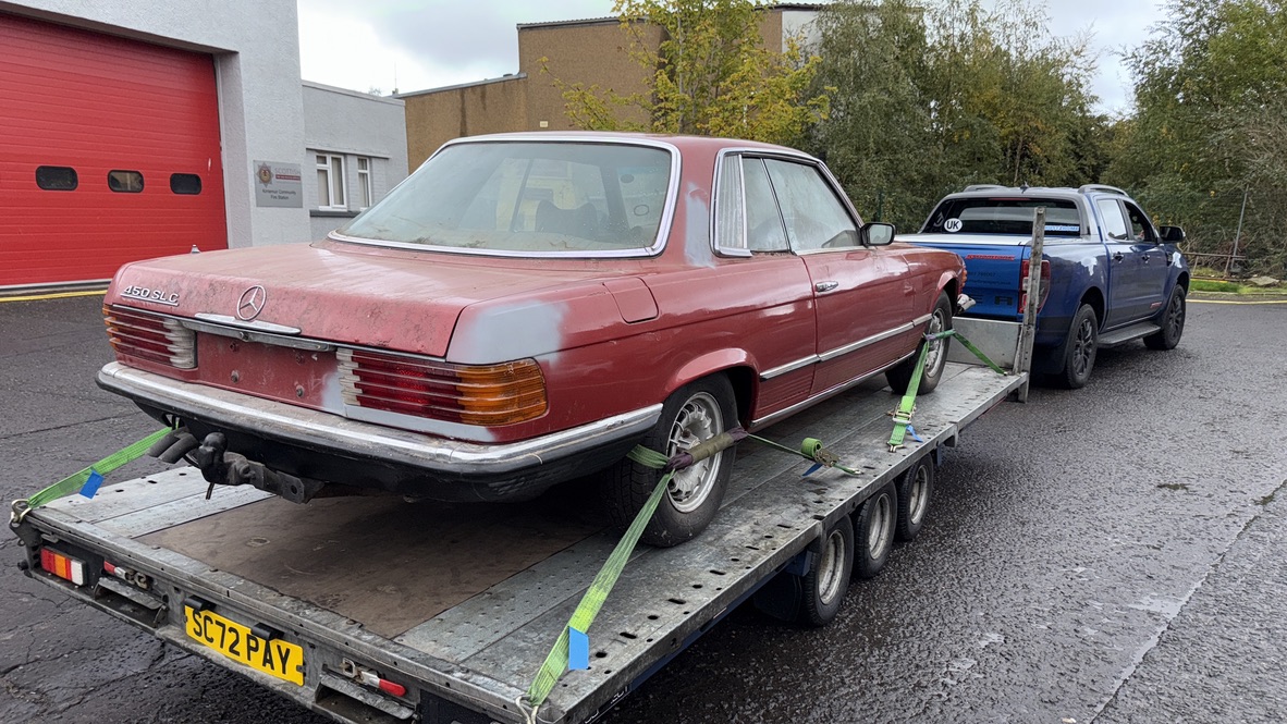 Classic Mercedes secured to the transport trailer